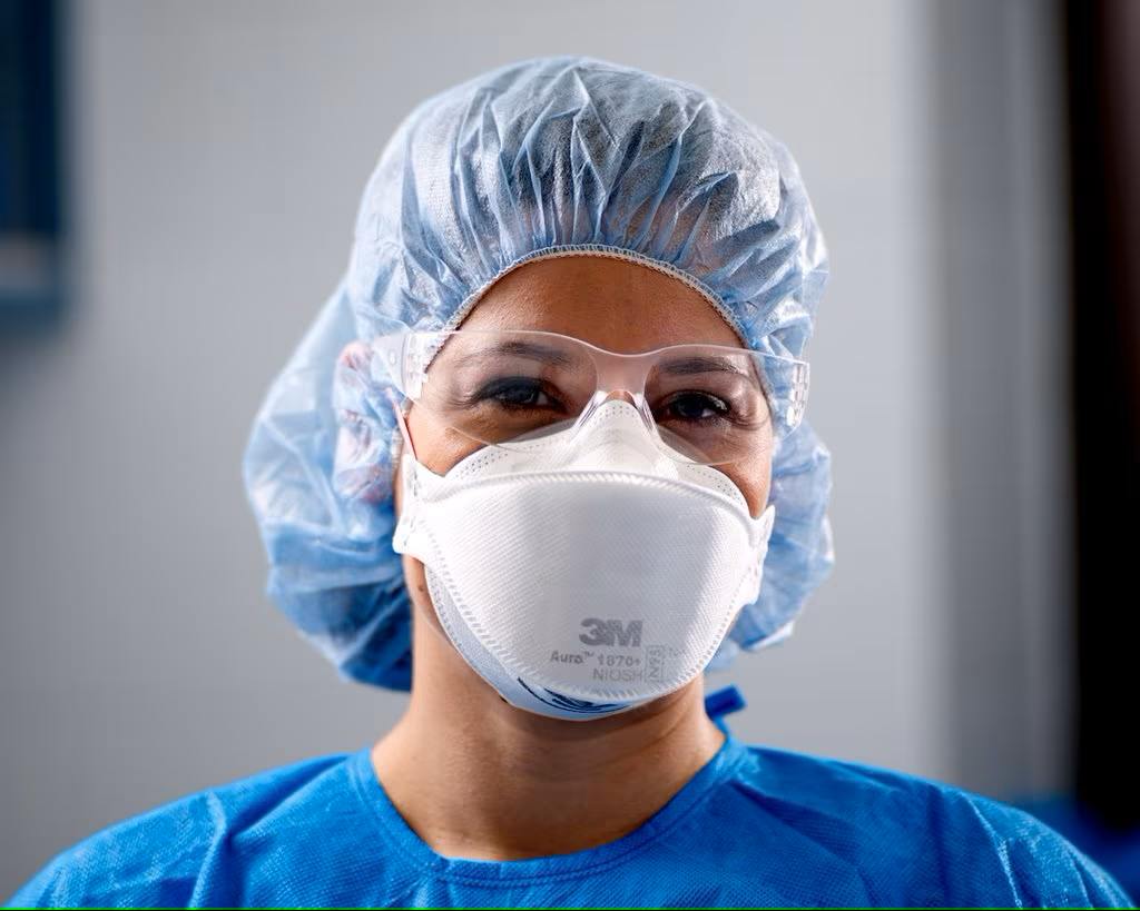 Healthcare worker wearing N95 respirator.